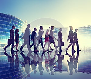 Group of Business People Walking Back Lit Concept