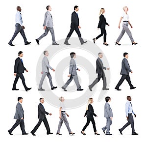 Group of Business People Walking in One Direction