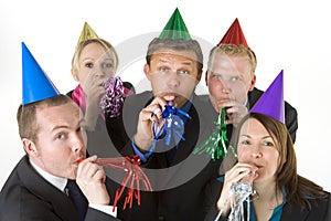 Group Of Business People Wearing Party Favors