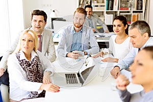 Group of business people working as team in office