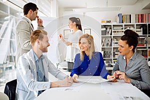 Group of business people working as team in office