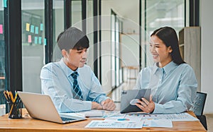 group of business people working and communicating together in the office With the charging of graphs for analysis, conceptual