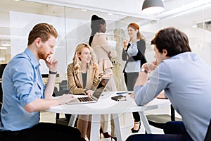 Group of business people working in office