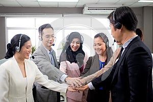 Group of business team harmony with man and woman joining hands stack together in enterprise for victory and success.
