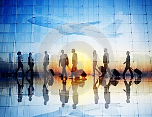 Group of Business Travelers Walking in an Airport