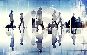 Group of Business Travelers Walking in the Airport photo