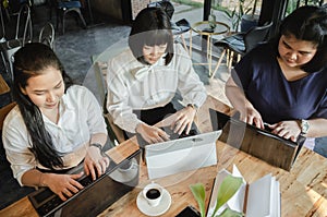 Group of business woman conference in cafe