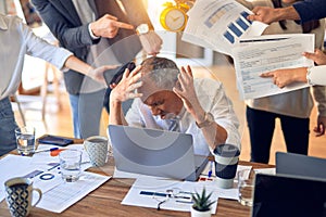 Group of business workers working together