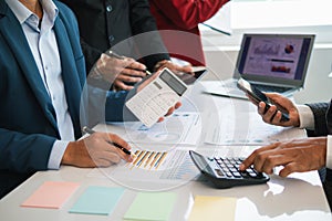 group businessmen and investors met together in conference room to view annual results their investments in business together in