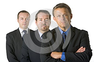 Group Of Businessmen Looking Stern