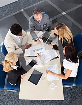 Group of businesspeople discussing together