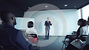 Group of businesspeople listening to a lecture