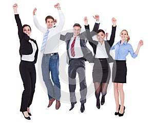 Group of businesspeople raising hands