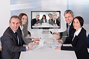 Group of businesspeople in video conference