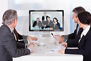 Group of businesspeople in video conference