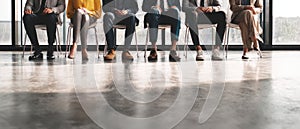 The group of candidates waiting for their job interviews in a modern office setting. AI generated image
