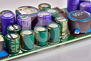 Group of capacitors different sizes on boards