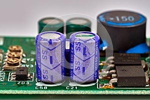 Group of capacitors different sizes on boards