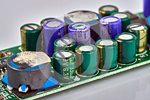 Group of capacitors different sizes on boards