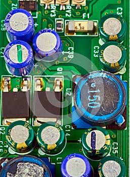 Group of capacitors different sizes on boards