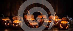 group of carved jack - o\' - lanterns with candles flickering inside, casting spooky shadows Halloween scene