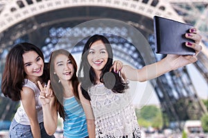 Group of casual girls taking self picture