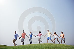 Group Casual People Walking Together Outdoors Concept