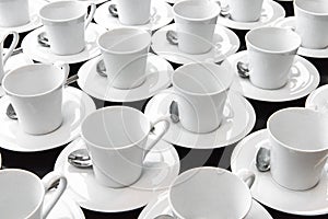 Group of ceramic white cup serving tea or coffee.