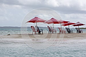 Group of chairs and umbrella on tropical beach, venezuela