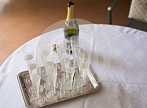 Group of champagne flutes glasses on the table