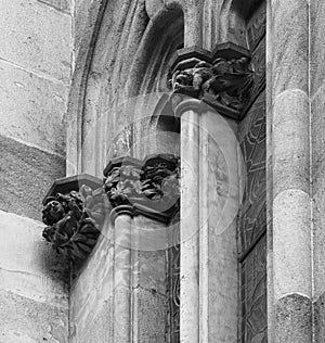 A group of characters standing on the capitals