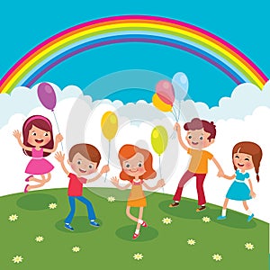 Group of cheerful children with balloons playing on the lawn