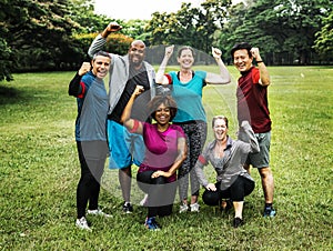 Group of cheerful diverse friends in the park