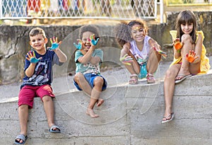 Group of cheerful multicultural children playing together photo