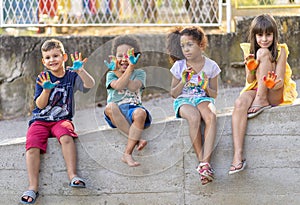 Group of cheerful multicultural children playing together photo