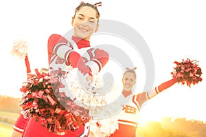 Group of cheerleaders performing at high school camp