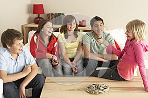 Group Of Children Chatting At Home