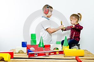 A group of children with construction tools, isolate of white background