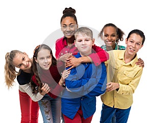 Group of children with different complexion embracing