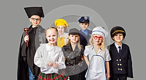 Group of children dressed in costumes of different professions