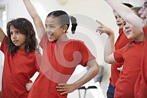 Group Of Children Enjoying Dance Class Together