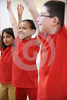 Group Of Children Enjoying Drama Class Together