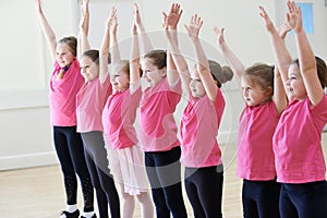 Group Of Children Enjoying Drama Class Together