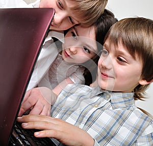 Group of children friends playing computer games