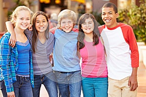 Group Of Children Hanging Out Together In Mall