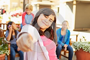 Group Of Children Hanging Out Together In Mall