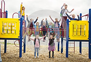 Group Of Children have fun play on the Playground