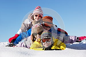 Group Of Children Having Fun On Ski Holiday