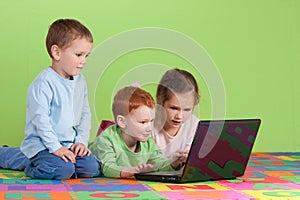 Group of children learning on kids computer