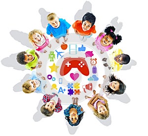 Group of Children Looking Up with Gaming Symbols